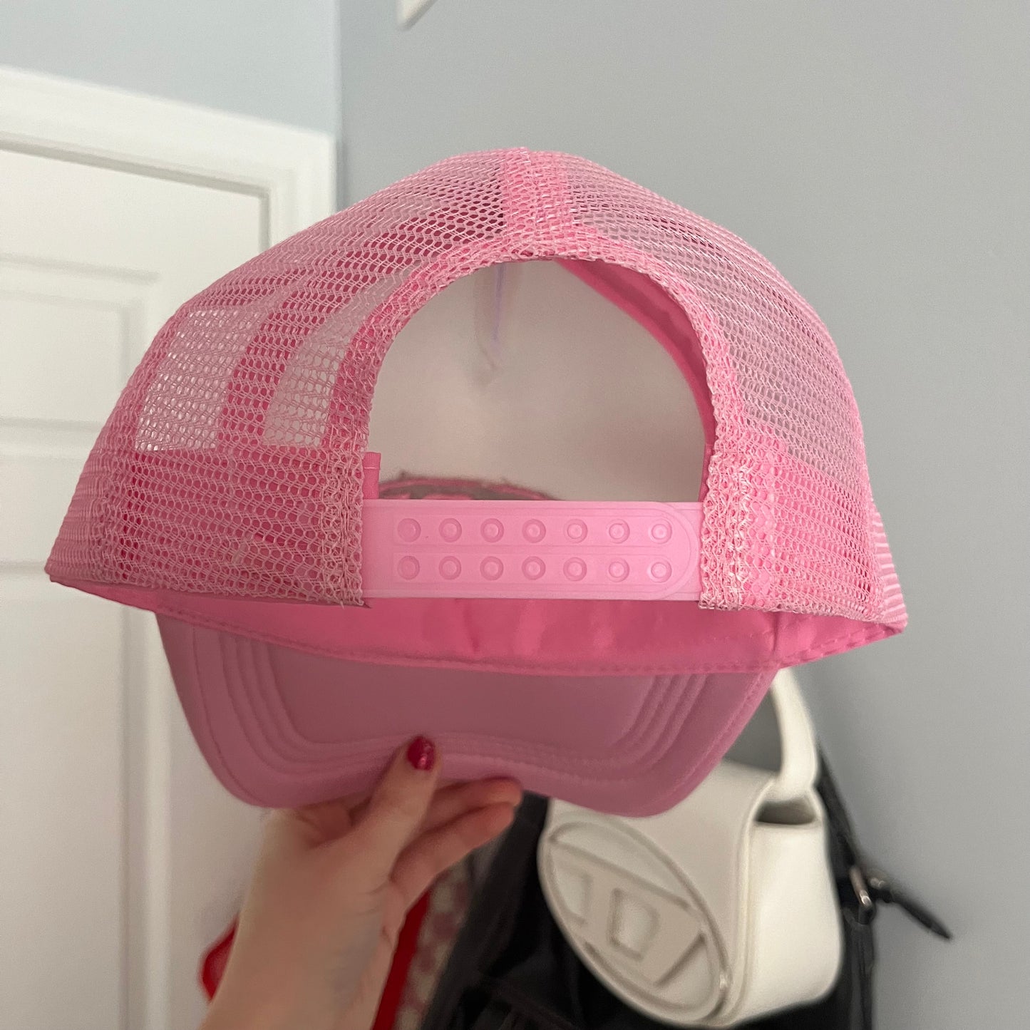 flop era trucker hat in pink