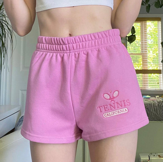 pink embroidered tennis shorts